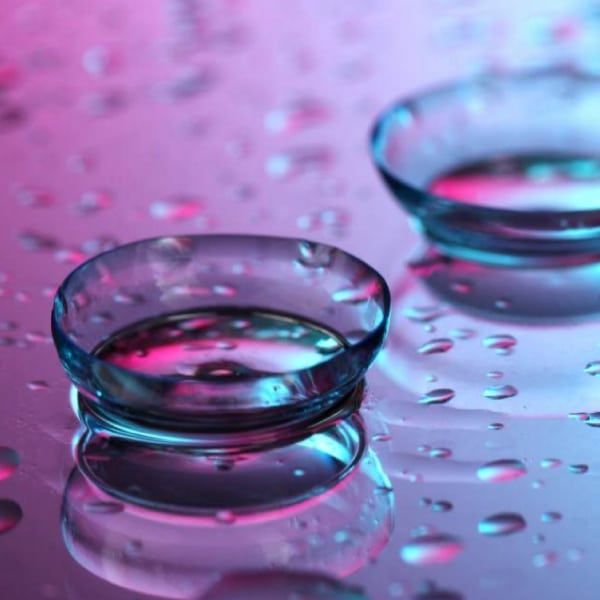 Contact lenses on colorful background