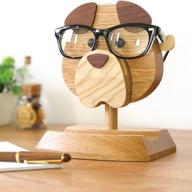 Glasses on an eyeglass holder stand in the shape of a dog