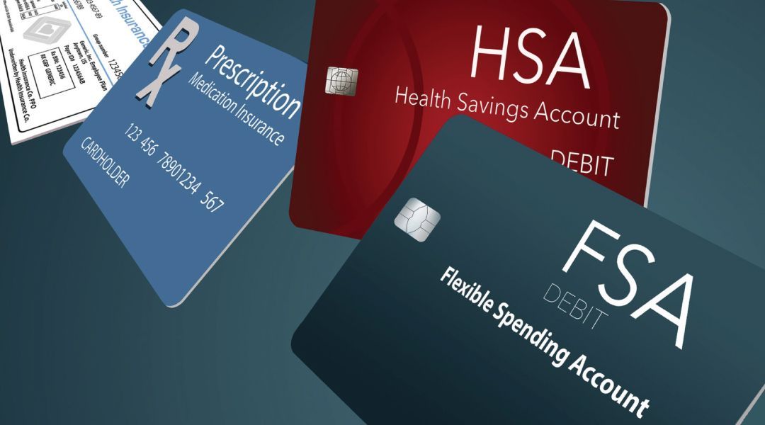 A medical insurace card, a prescription card, an FSA debit card, and a HSA debit card