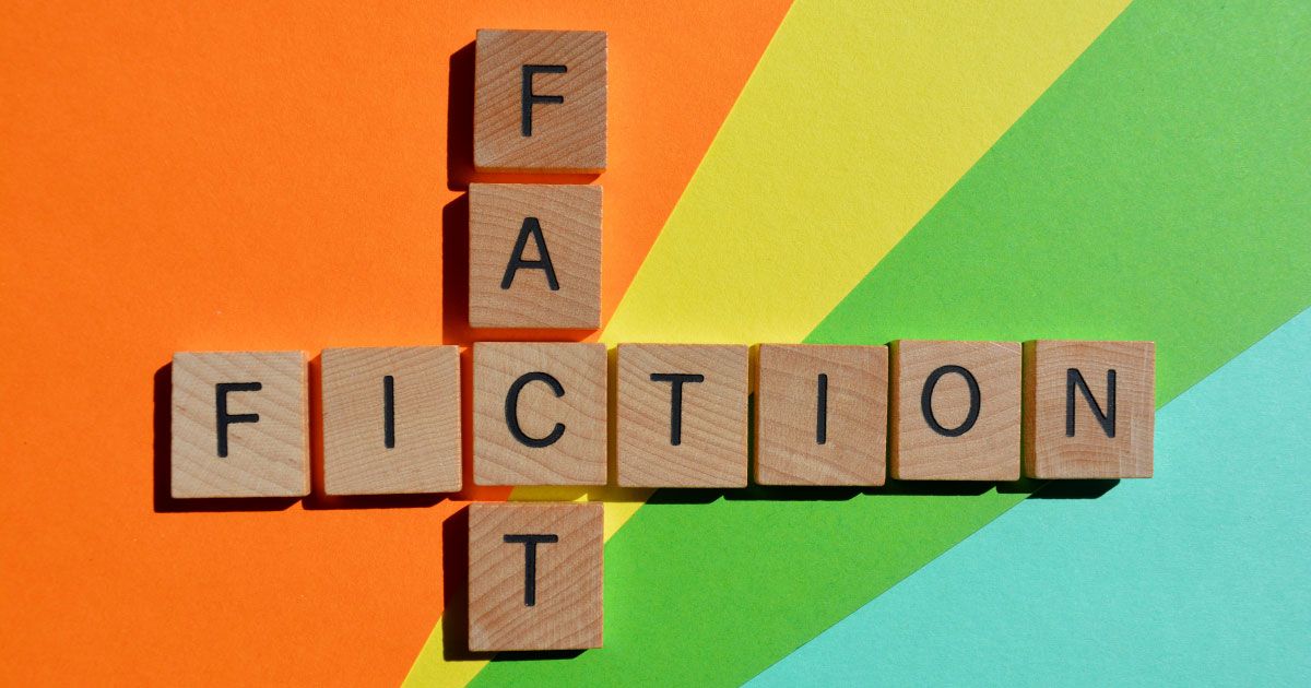 The word fiction and fact are spelled out in wooden scrabble blocks on a rainbow background.