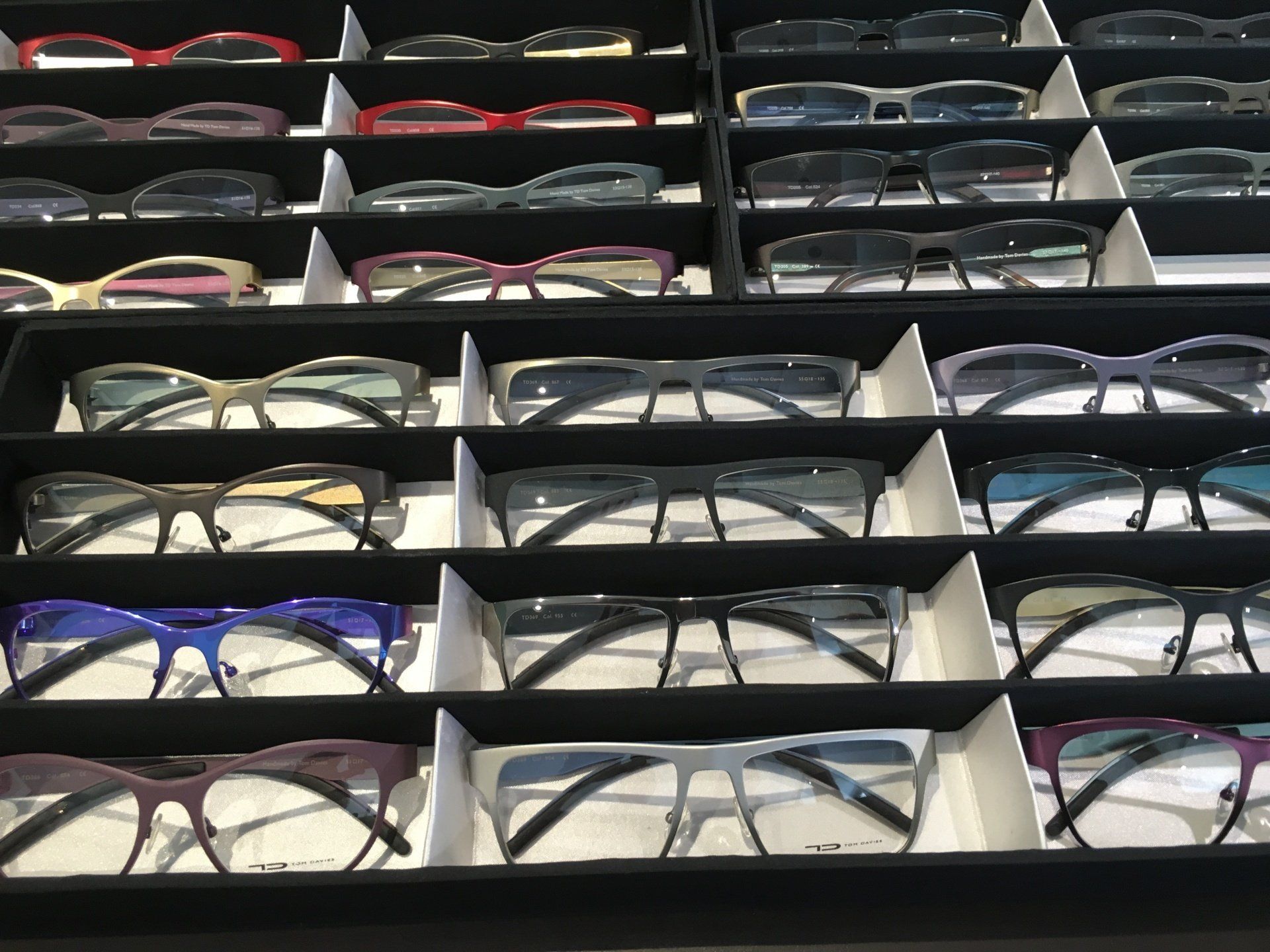 Display box of frames at Gold & Wood and Tom Davies Trunk Show