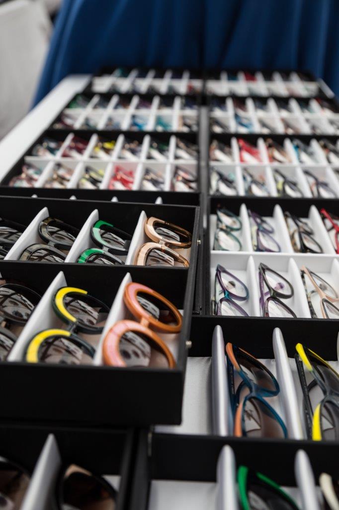 Black display boxes of colorful framelines  at 2018 Raise Your Glasses