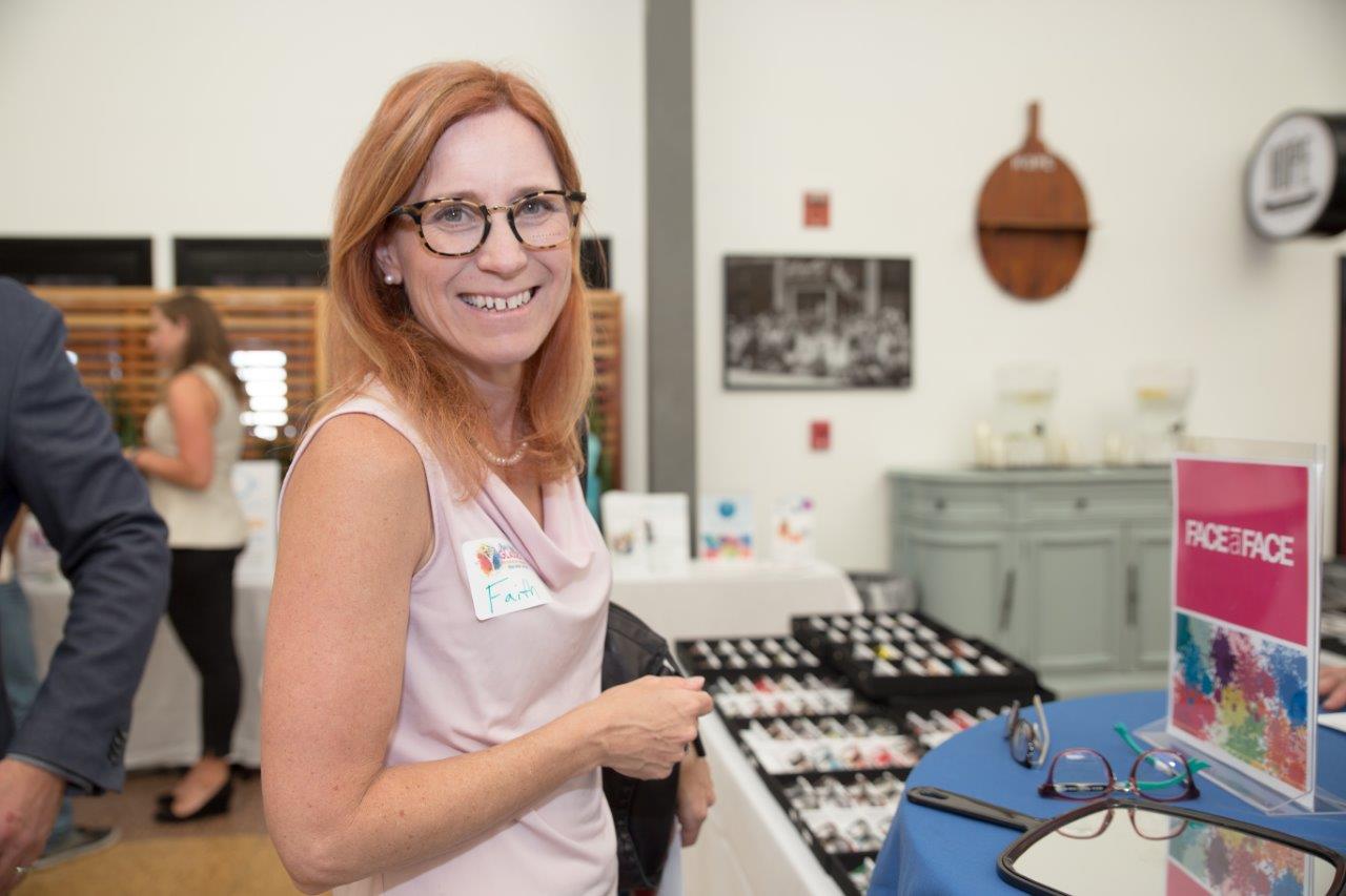 Person modeling frames at Raise Your Glasses 2018 Event