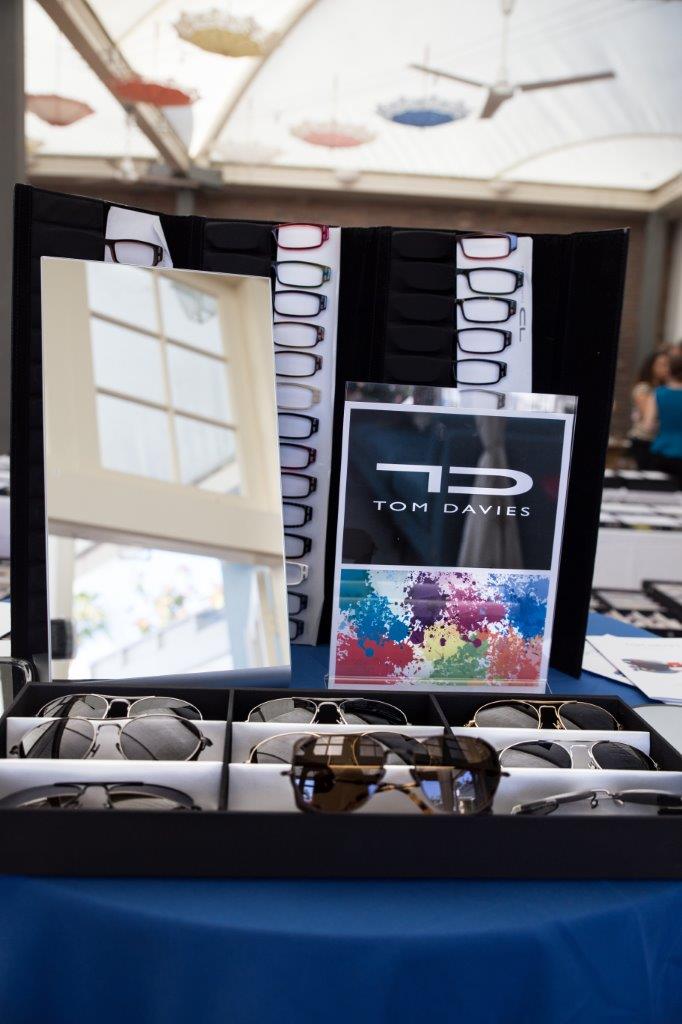 Tom Davies tabletop display with sign and frames at  Raise Your Glasses 2018 Event