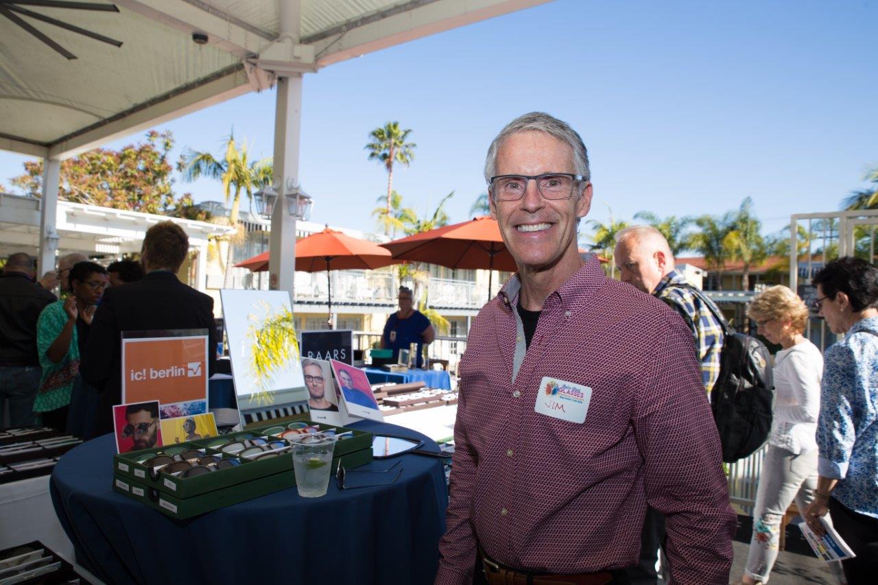 Man wearing glasses standing outdoors during Raise Your Glasses 2018 Event