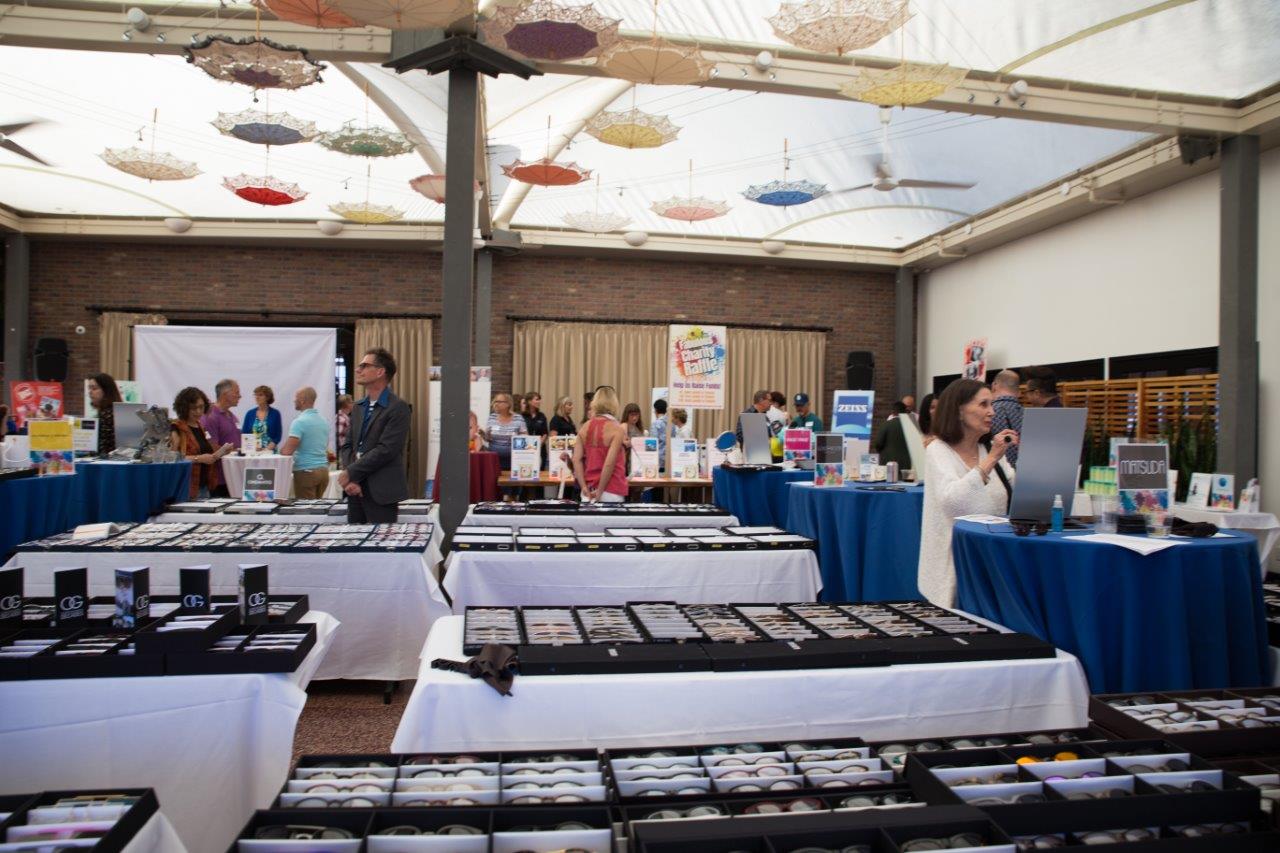 View of many tabletop frameline displays at Raise Your Glasses 2018 Event