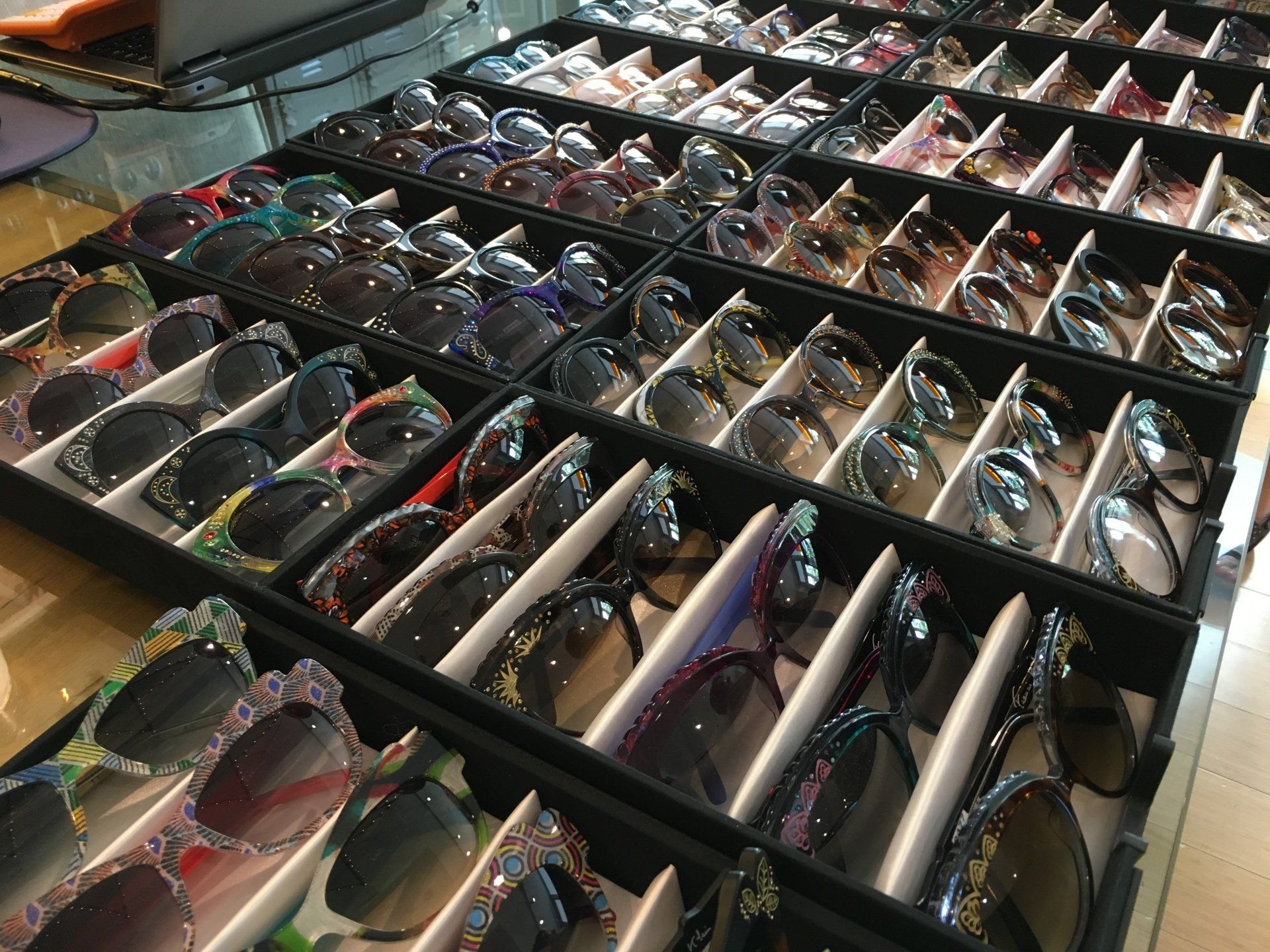 Many frames in display boxes at 2017 Francis Klein Trunk Show