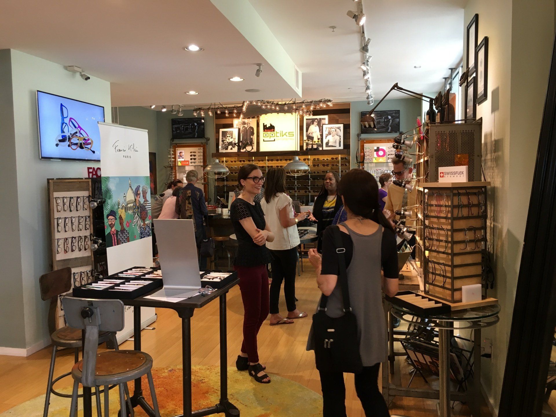People viewing frames at 2017 Francis Klein Trunk Show