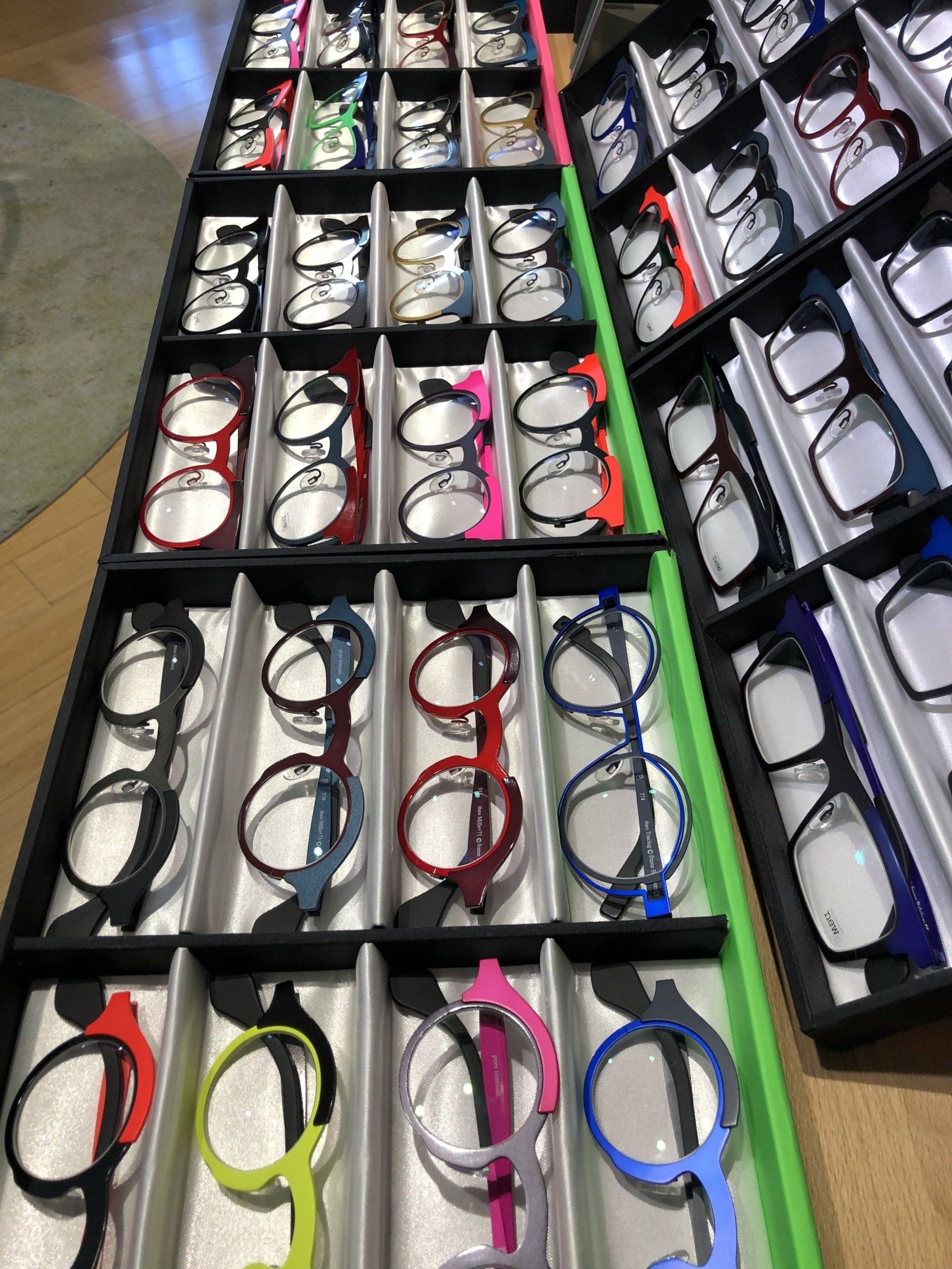 Many display cases of Theo frames at Theo Trunk Show Event