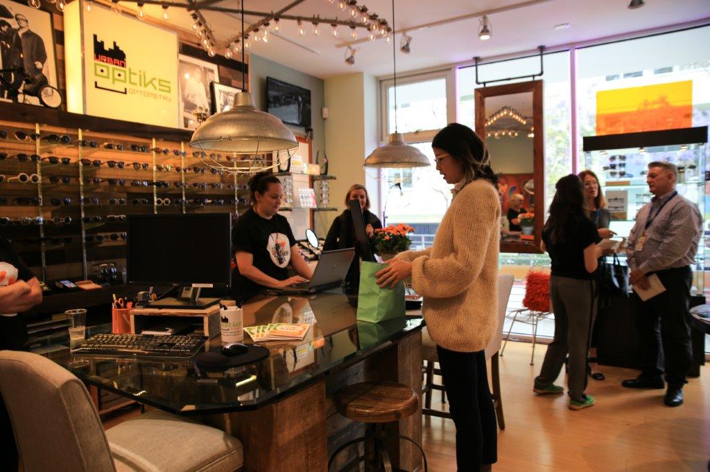 People shopping inside Urban Optiks Optometry at Raise Your Glasses 2017 Event