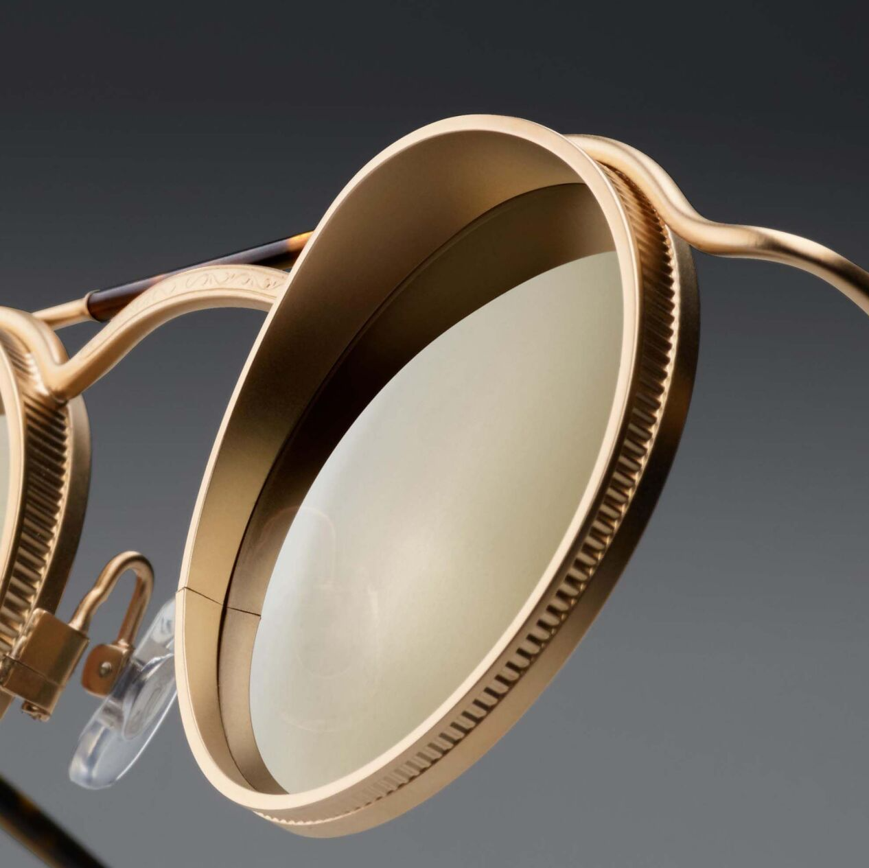 Matsuda sunglasses in gold metal with gold mirror tint lenses