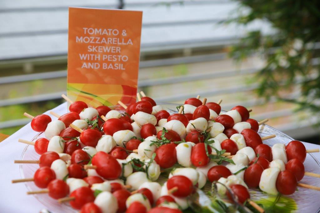 Tomato and cheese appetizer display at Raise Your Glasses 2017 Event