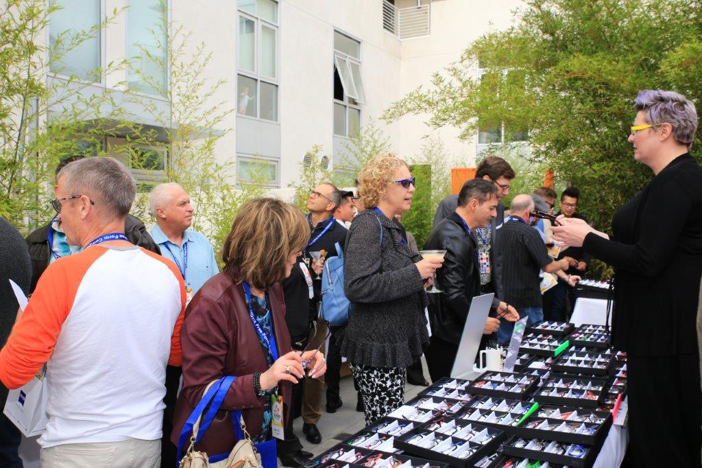 Many people looking at frameline displays  at Raise Your Glasses 2017 Event