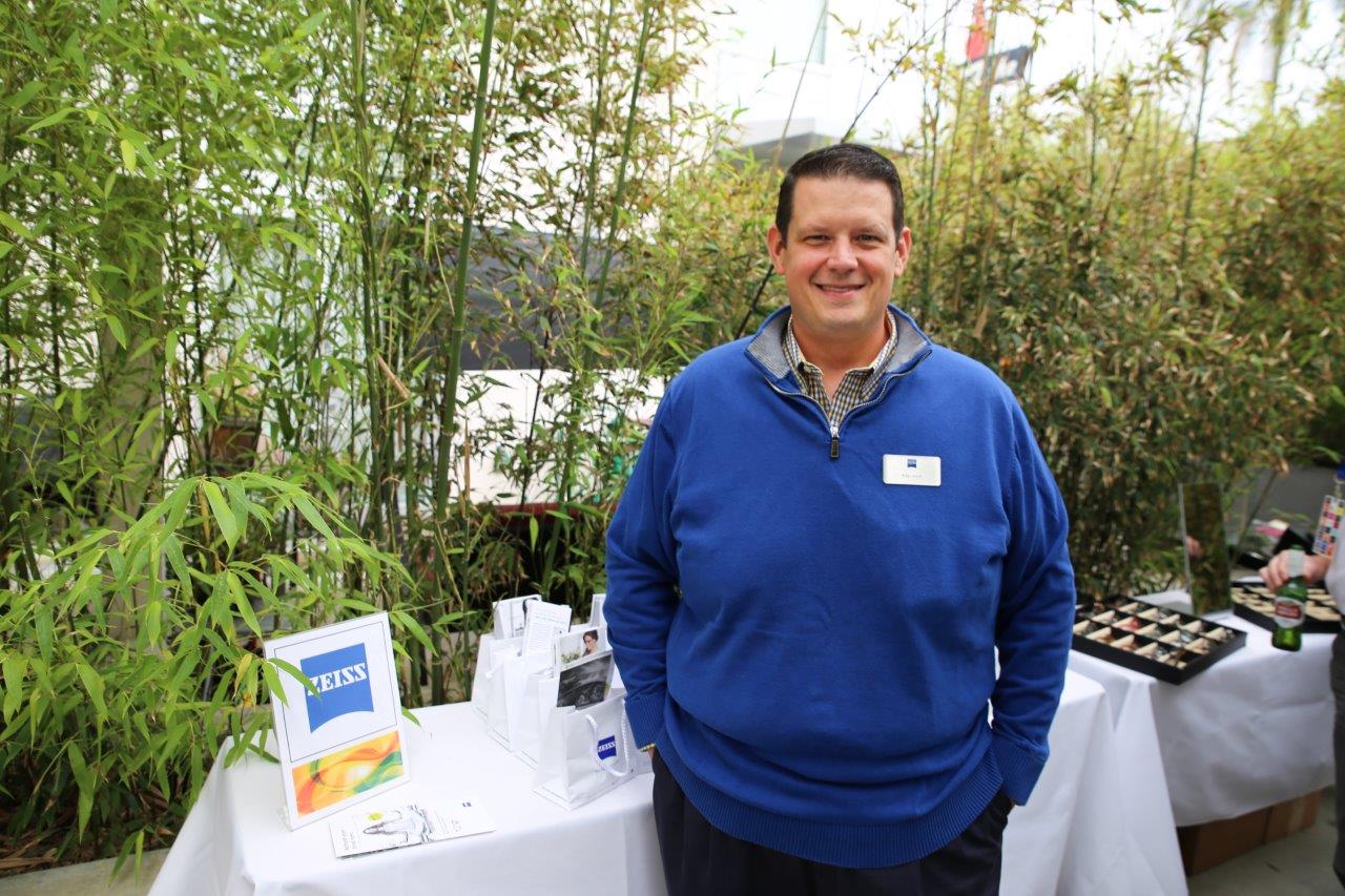 Person standing at table at Raise Your Glasses 2017