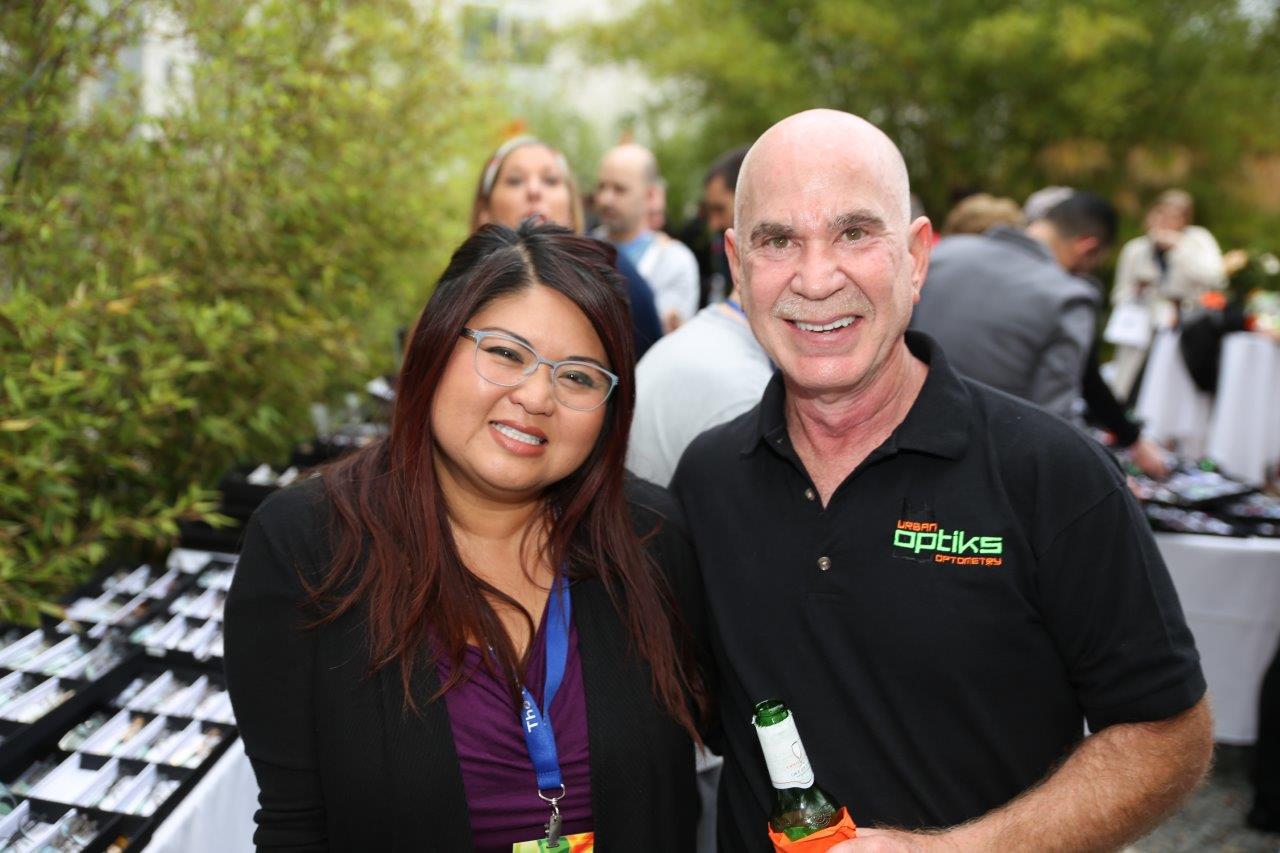 2 smiling people standing outside at Raise Your Glasses 2017 Event
