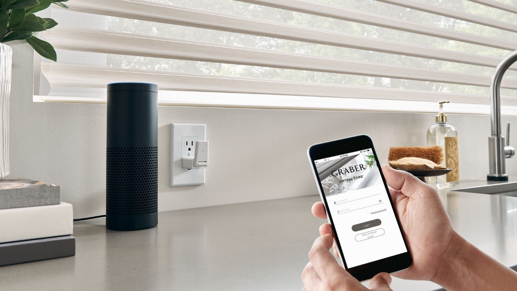 Graber sheer shades in kitchen with hands holding smart phone using motorization app to control shades