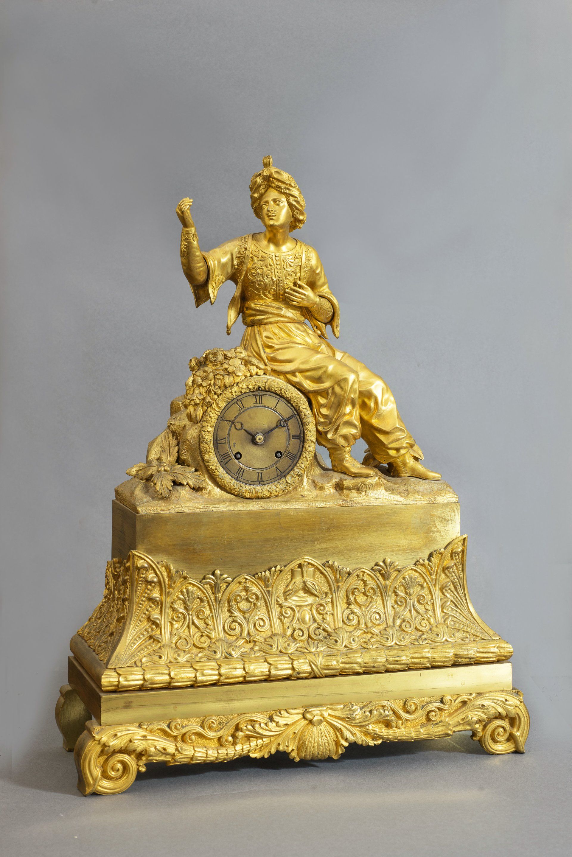 Orologio in bronzo dorato al mercurio raffigurante un personaggio con turbante prima metà del XIX secolo