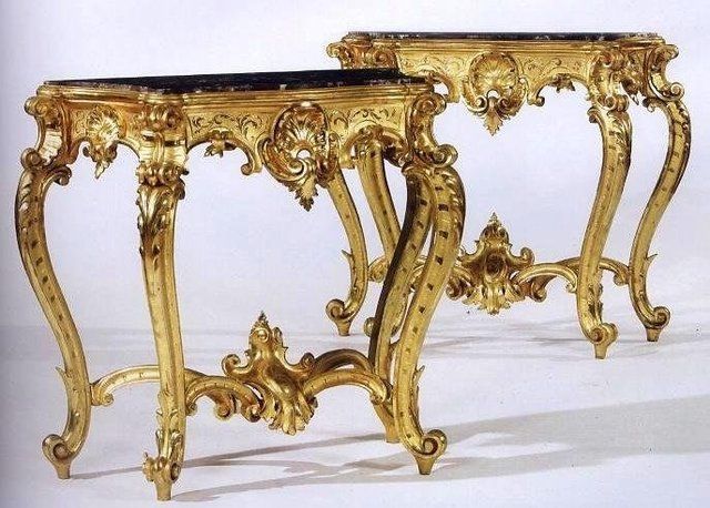 Coppia di consolle in legno intagliato e dorato a oro fino e marmo rosso Levanto