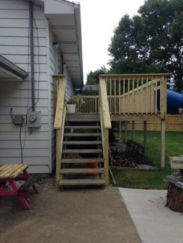 Renovation — New Wooden Deck With Railing in Greenville, WI