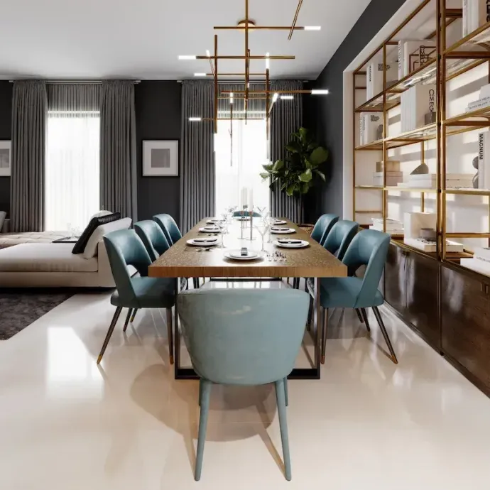 Dining room with a long wooden table, blue chairs, and a gold shelving unit.