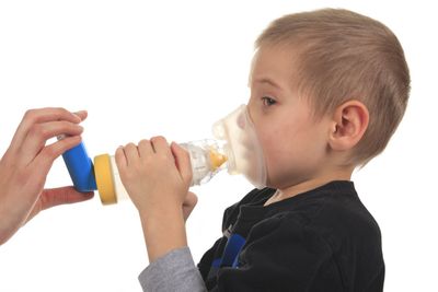 A child with an oxygen mask