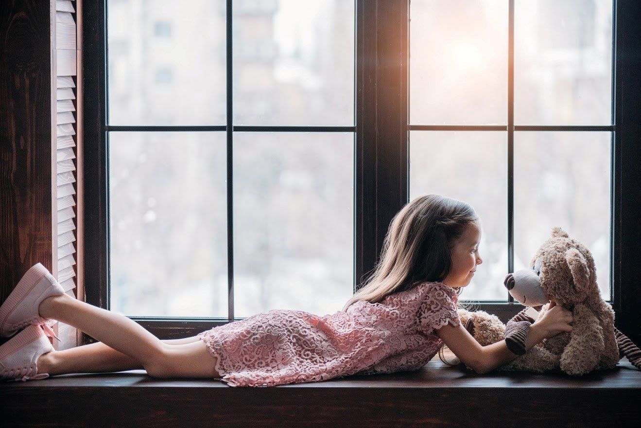 Little girl by the window — Littleton, CO — Ken Caryl Glass Inc.