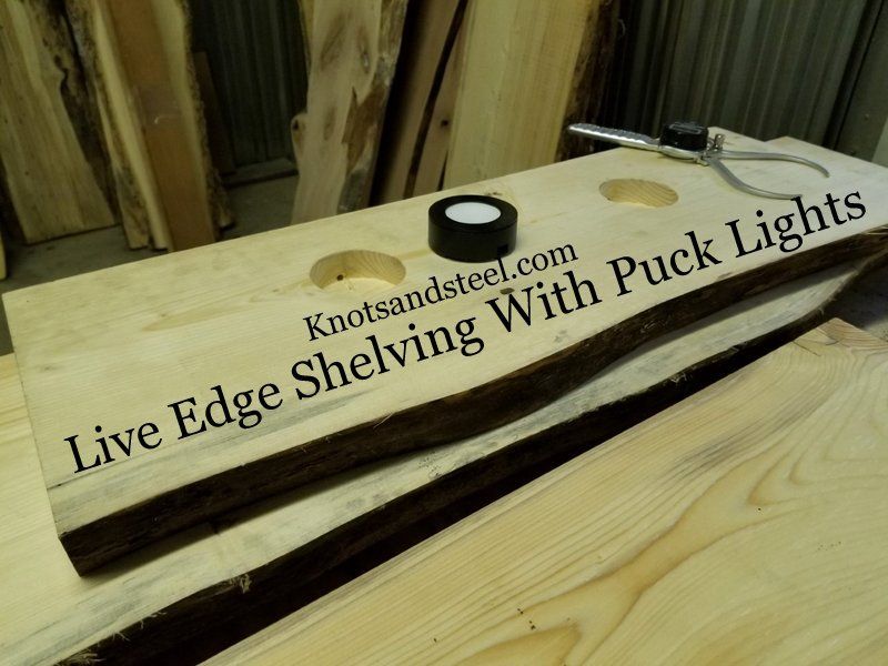 Live edge floating shelving with LED puck lights. Puck lights installation in floating shelves