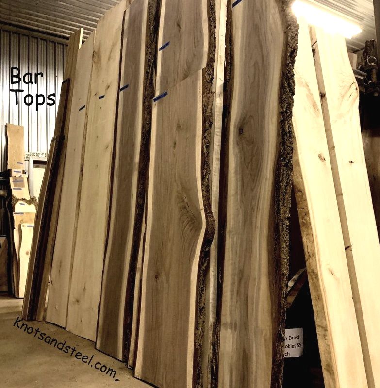 Live edge lumber bar tops for sale at our location.