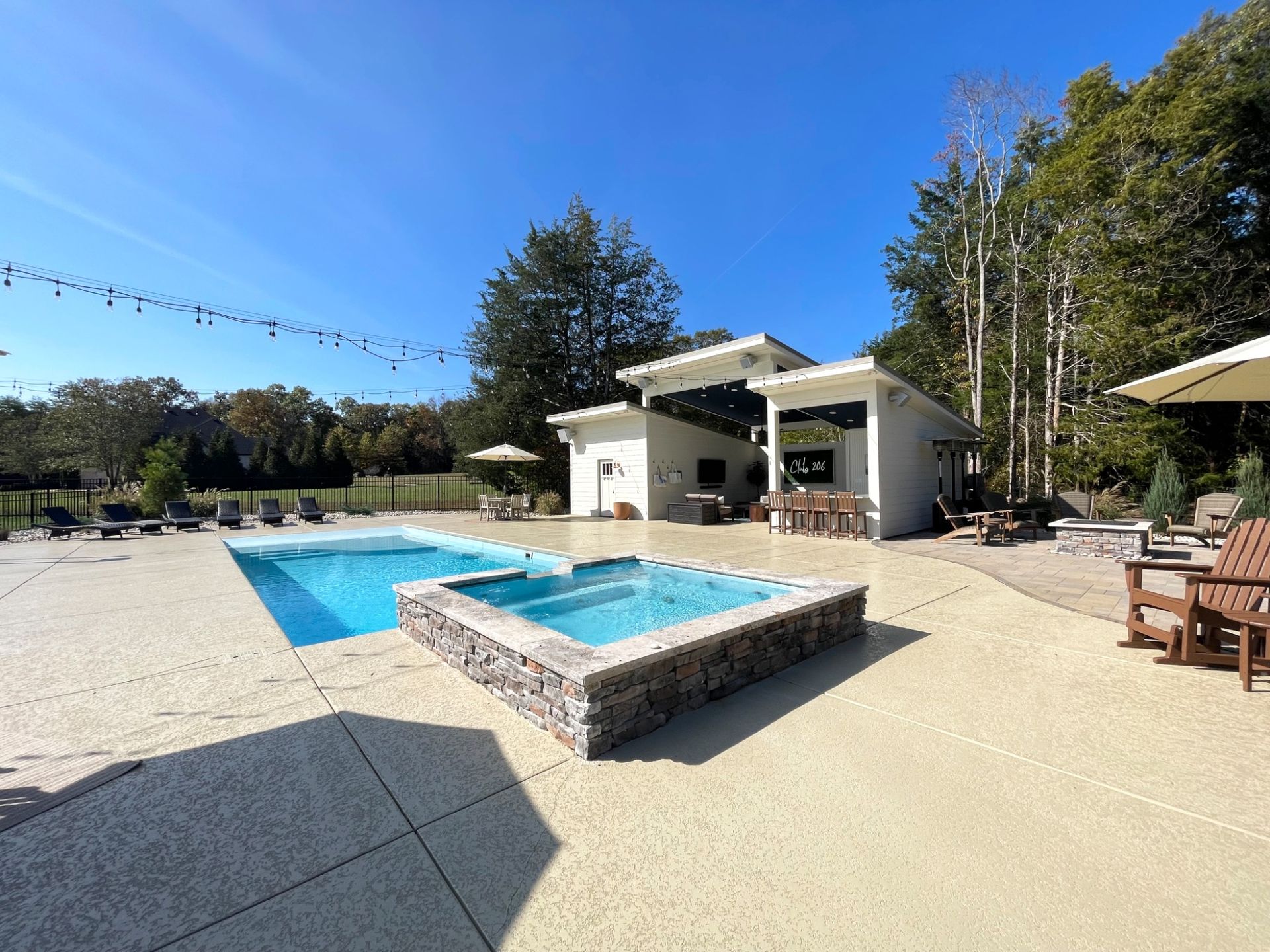 Transition from elevated spa to Grace beach entry pool by Majestic Swim in Murfreesboro TN