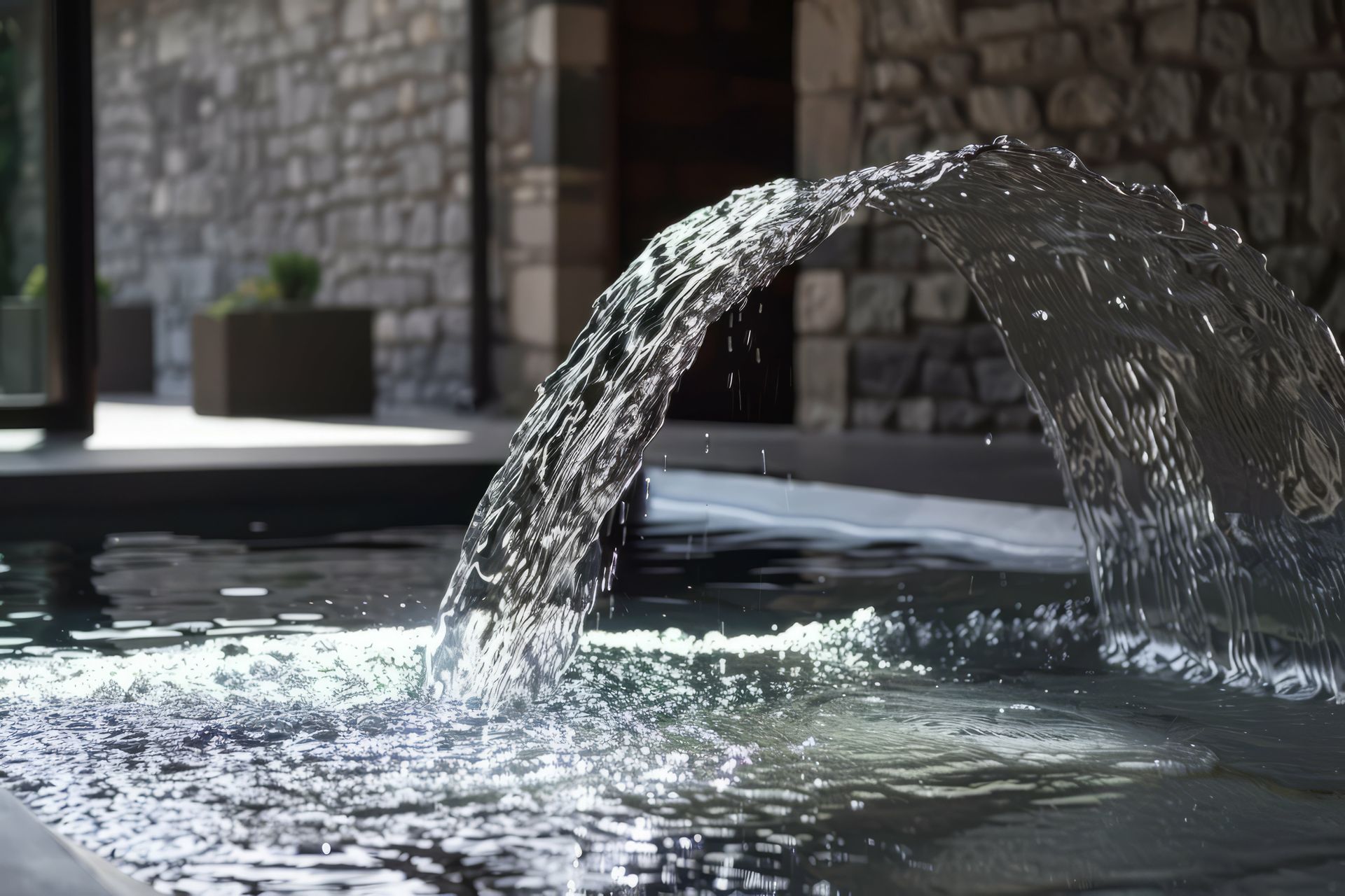 waterfall fountain in a pool