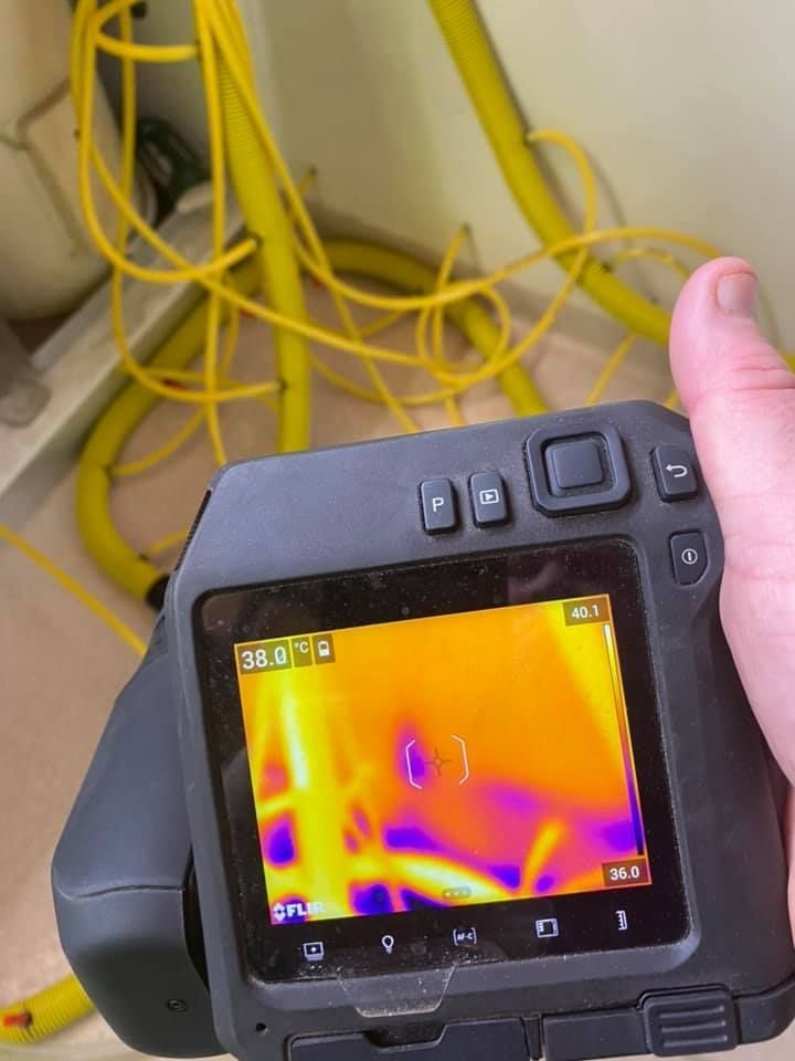 A Person is Holding a Thermal Camera — Restore All Qld in Western Downs, QLD