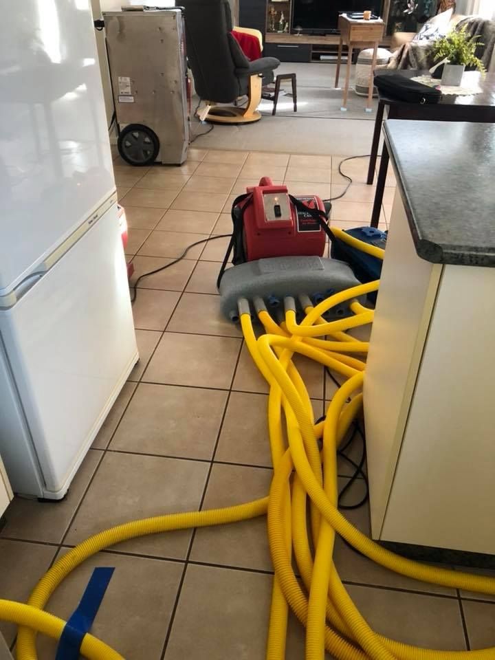 A Room is Being Cleaned Using Structural Drying Machine — Restore All Qld in Toowoomba, QLD