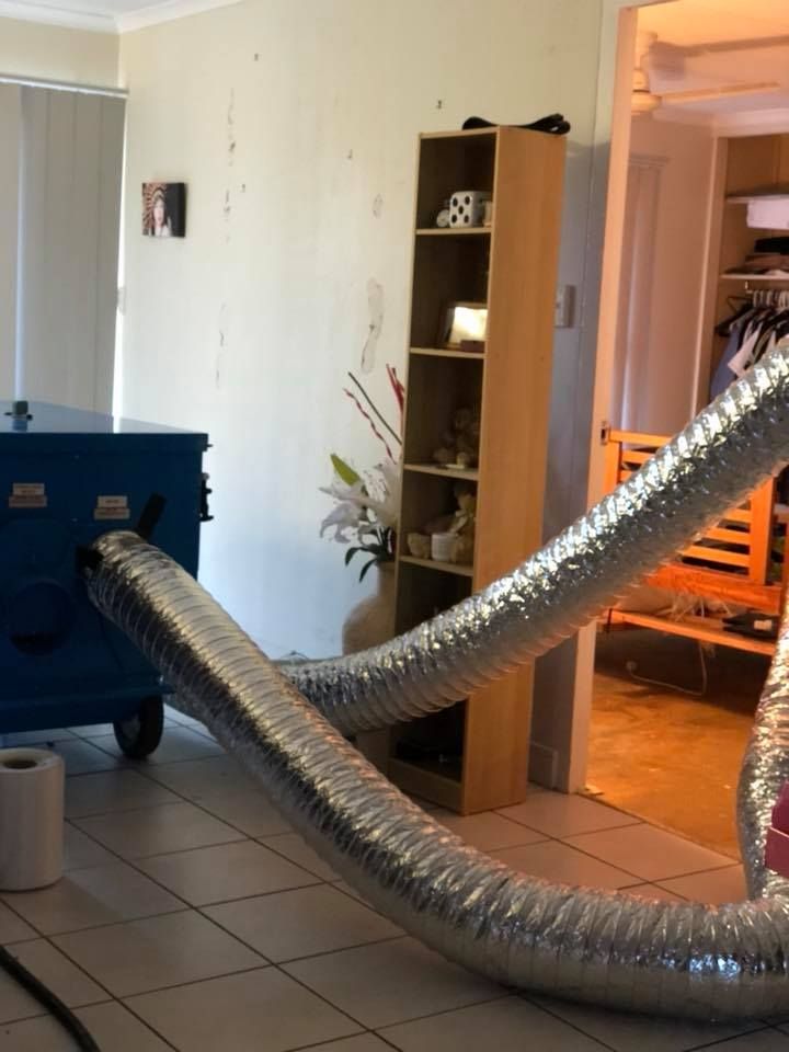 A Room is Being Cleaned Using Structural Drying Machine — Restore All Qld in Western Downs, QLD