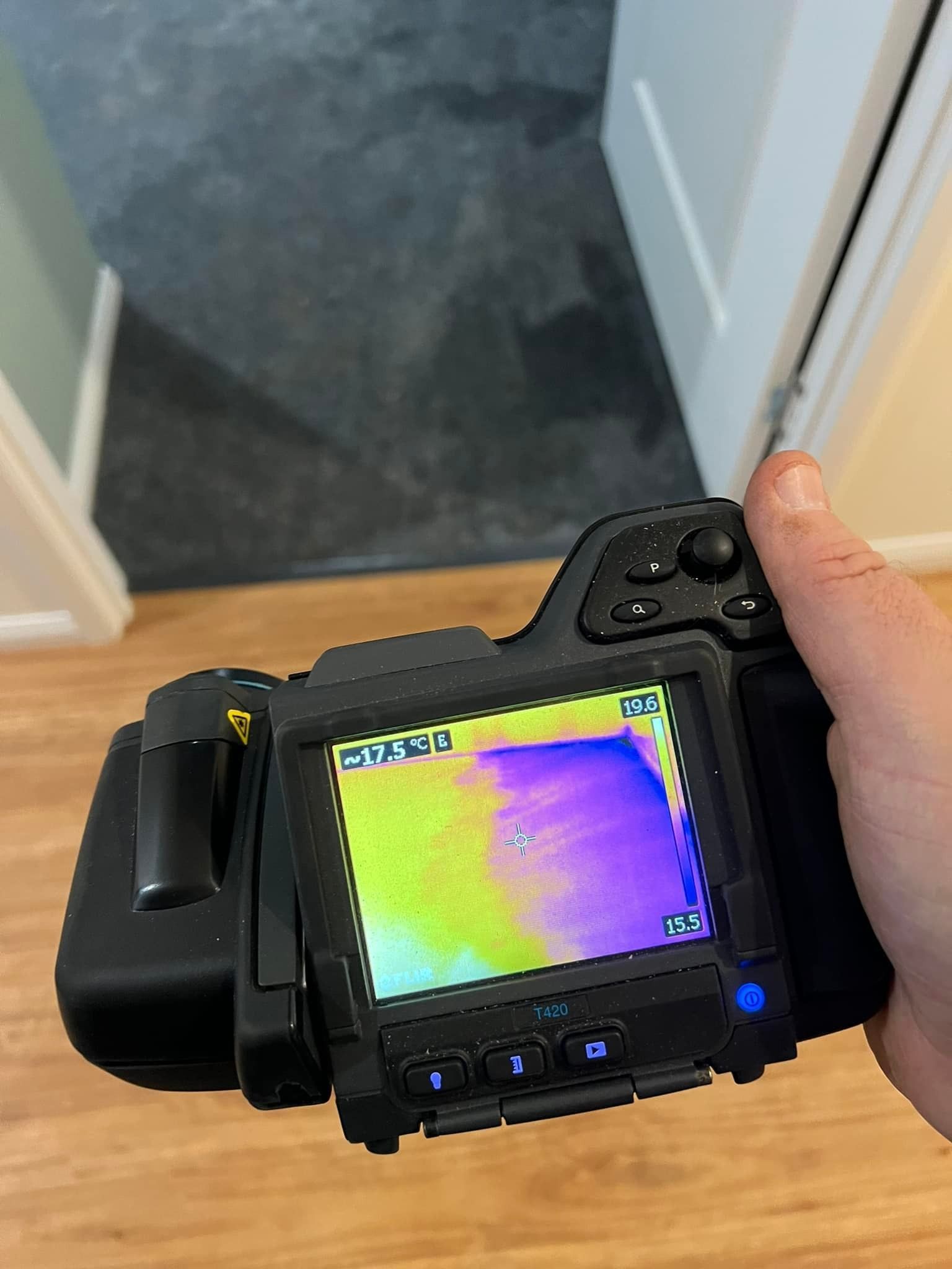 A Person is Holding a Thermal Camera — Restore All Qld in Sunshine Coast, QLD