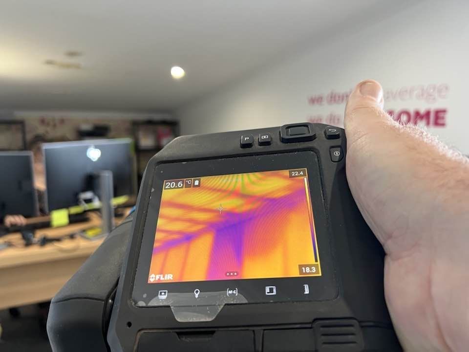 A Person is Holding a Thermal Camera — Restore All Qld in Kingaroy, QLD