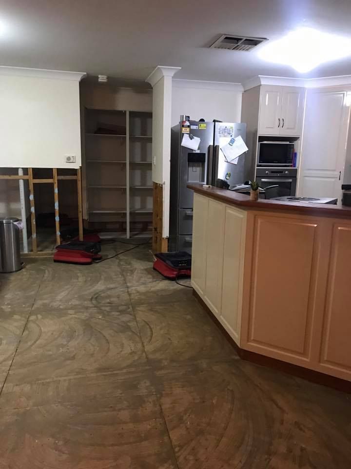 A Kitchen is Being Cleaned and Organized — Restore All Qld in Kingaroy, QLD