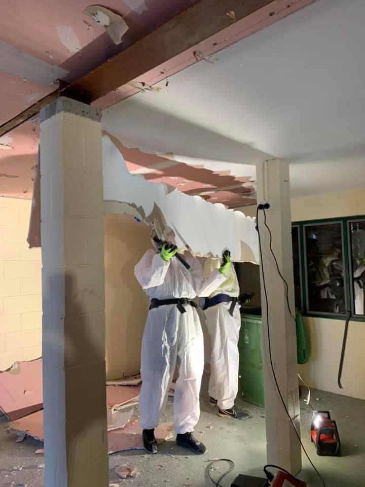 Two Men Are Cleaning the House — Restore All Qld in Bundaberg, QLD