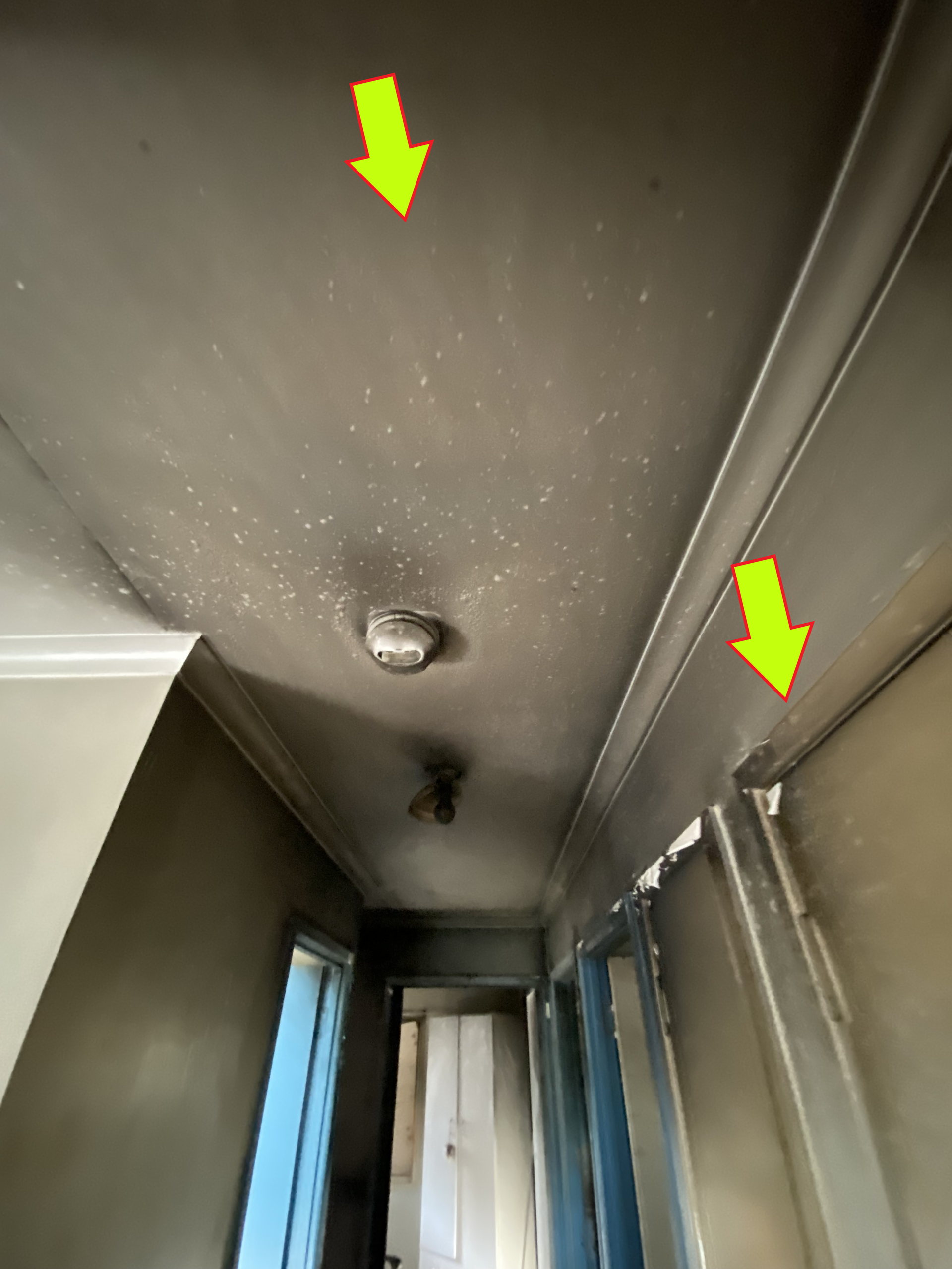 A Hallway With a Smoke Detector on the Ceiling — Restore All Qld in Kingaroy, QLD