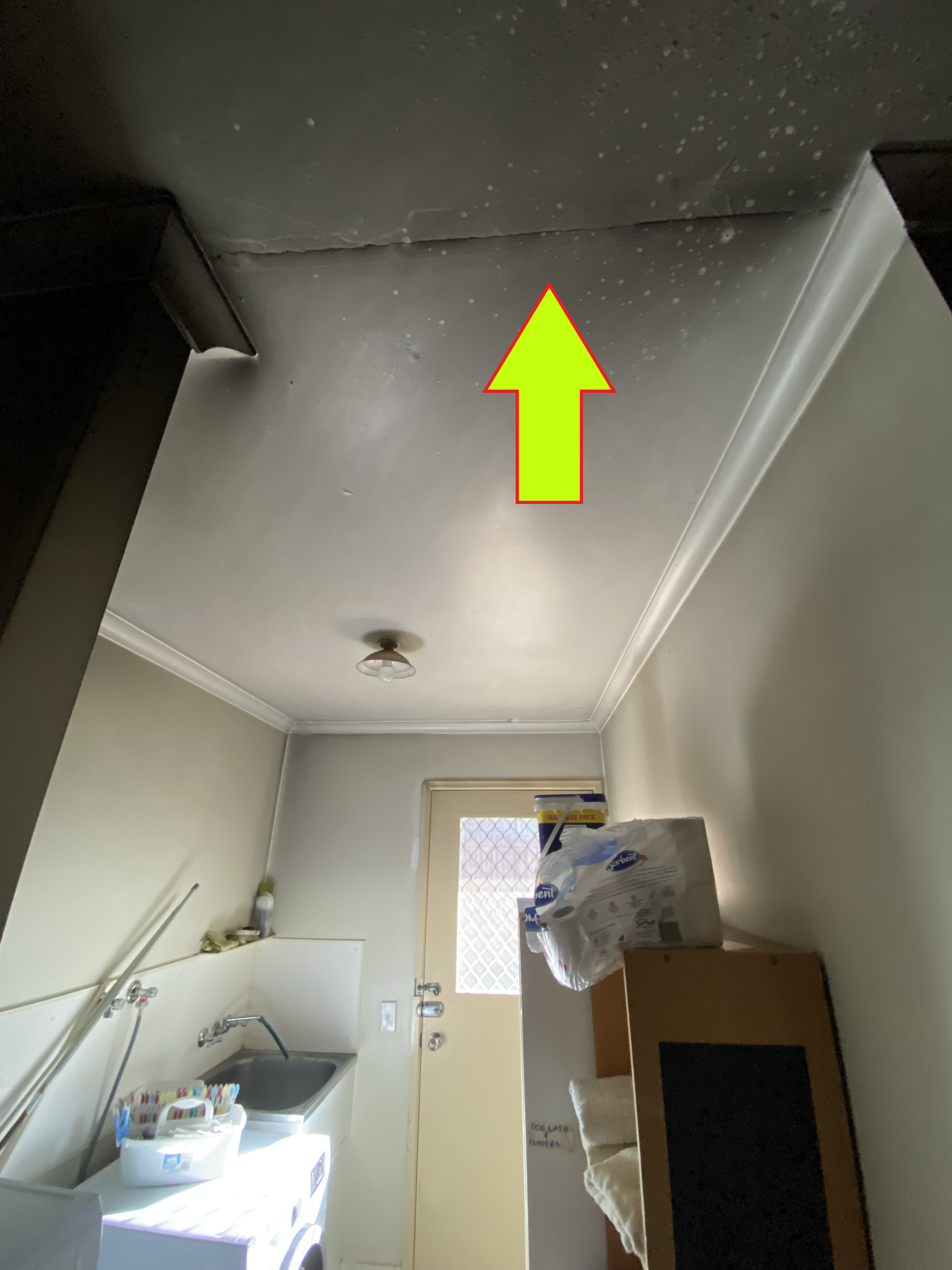 A Hallway With a Red Cross Painted on the Wall — Restore All Qld in Kingaroy, QLD
