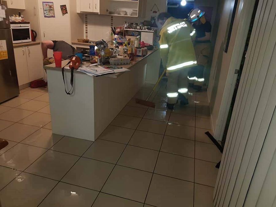 A Group of People Are Cleaning in a Kitchen — Restore All Qld in South Burnett, QLD