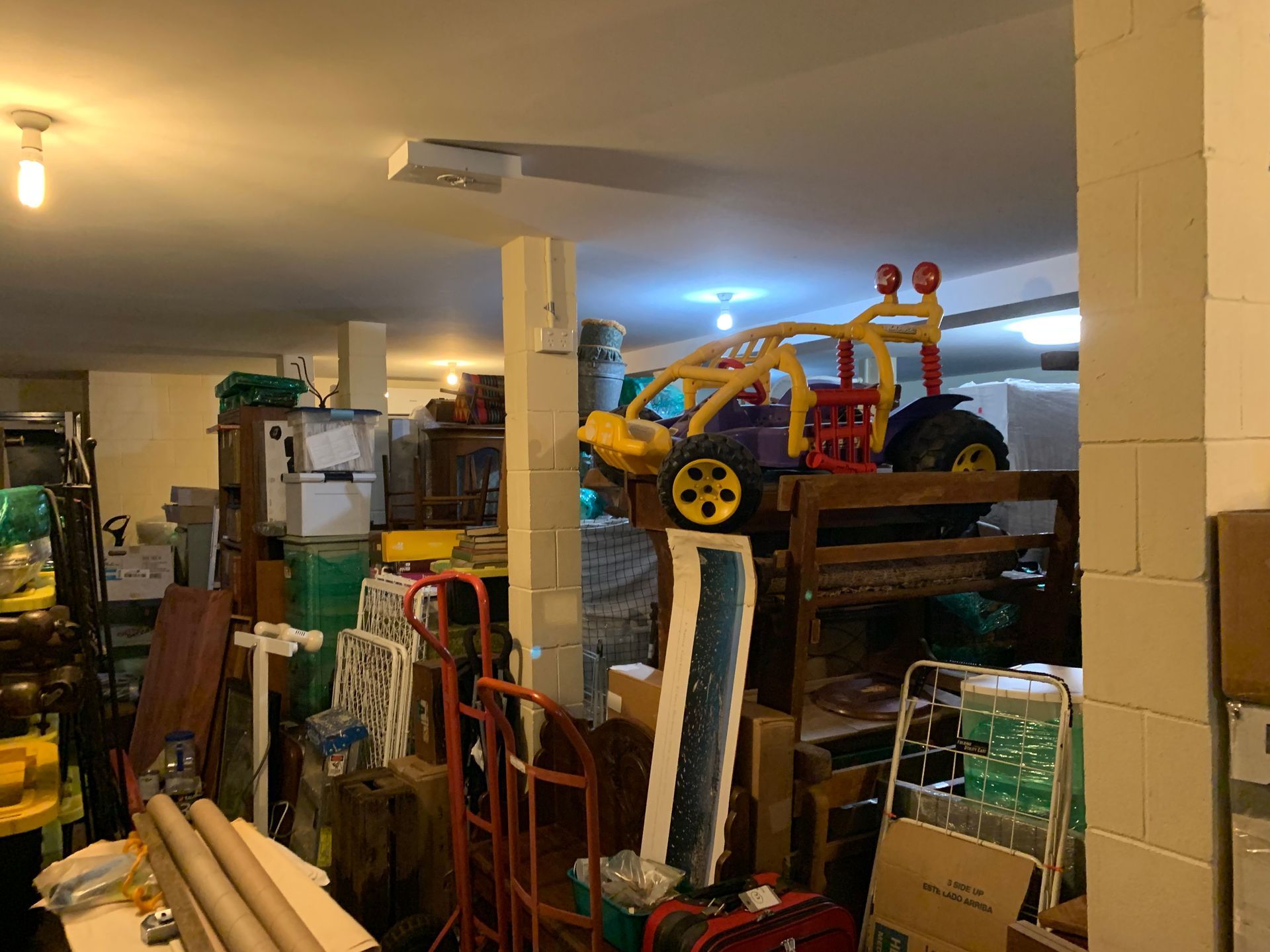 A Man is Driving a Bulldozer  to Clean the Garage — Restore All Qld in Kingaroy, QLD