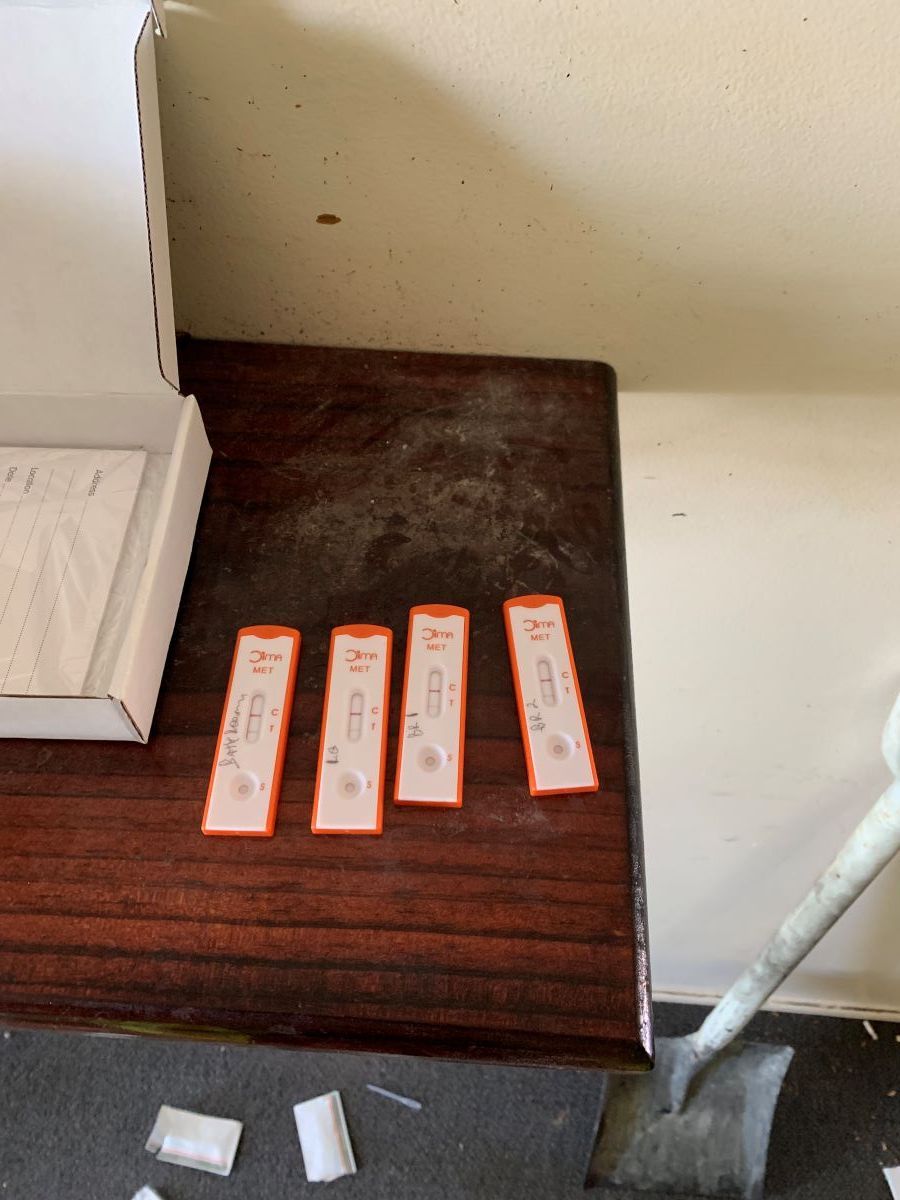 A Wooden Table With a Box of Slides — Restore All Qld in Kingaroy, QLD