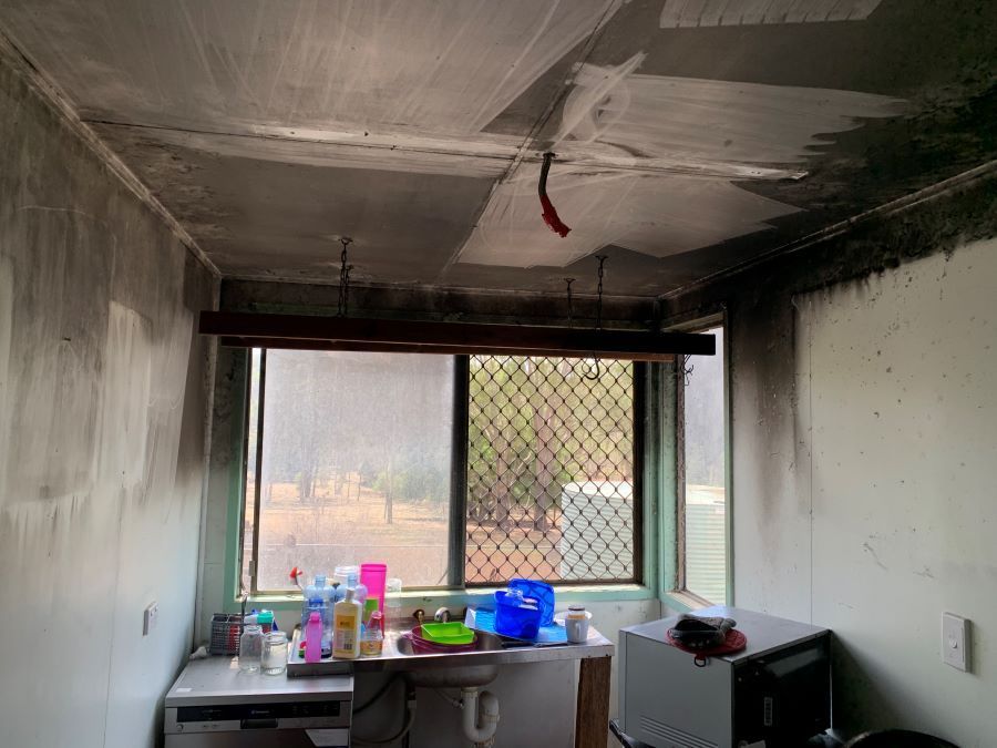 A Kitchen With a Broken Ceiling and a Sink — Restore All Qld in Kingaroy, QLD