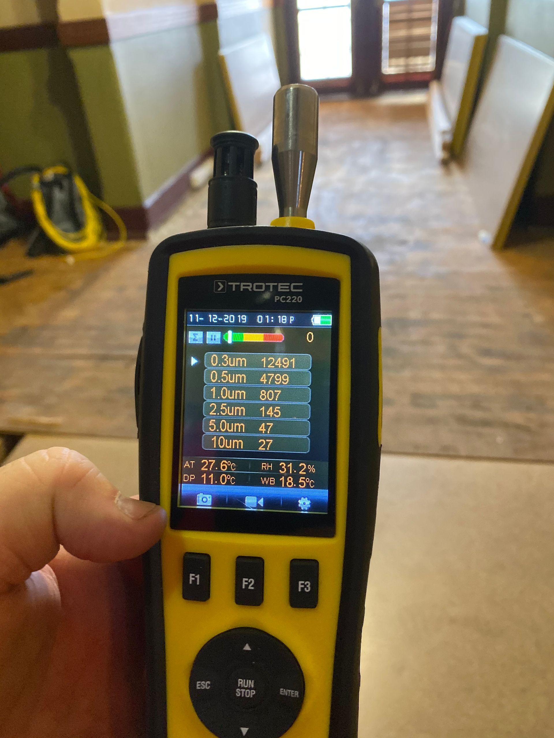 A Mould Test is Sitting on a Tiled Floor — Restore All Qld in Kingaroy, QLD 