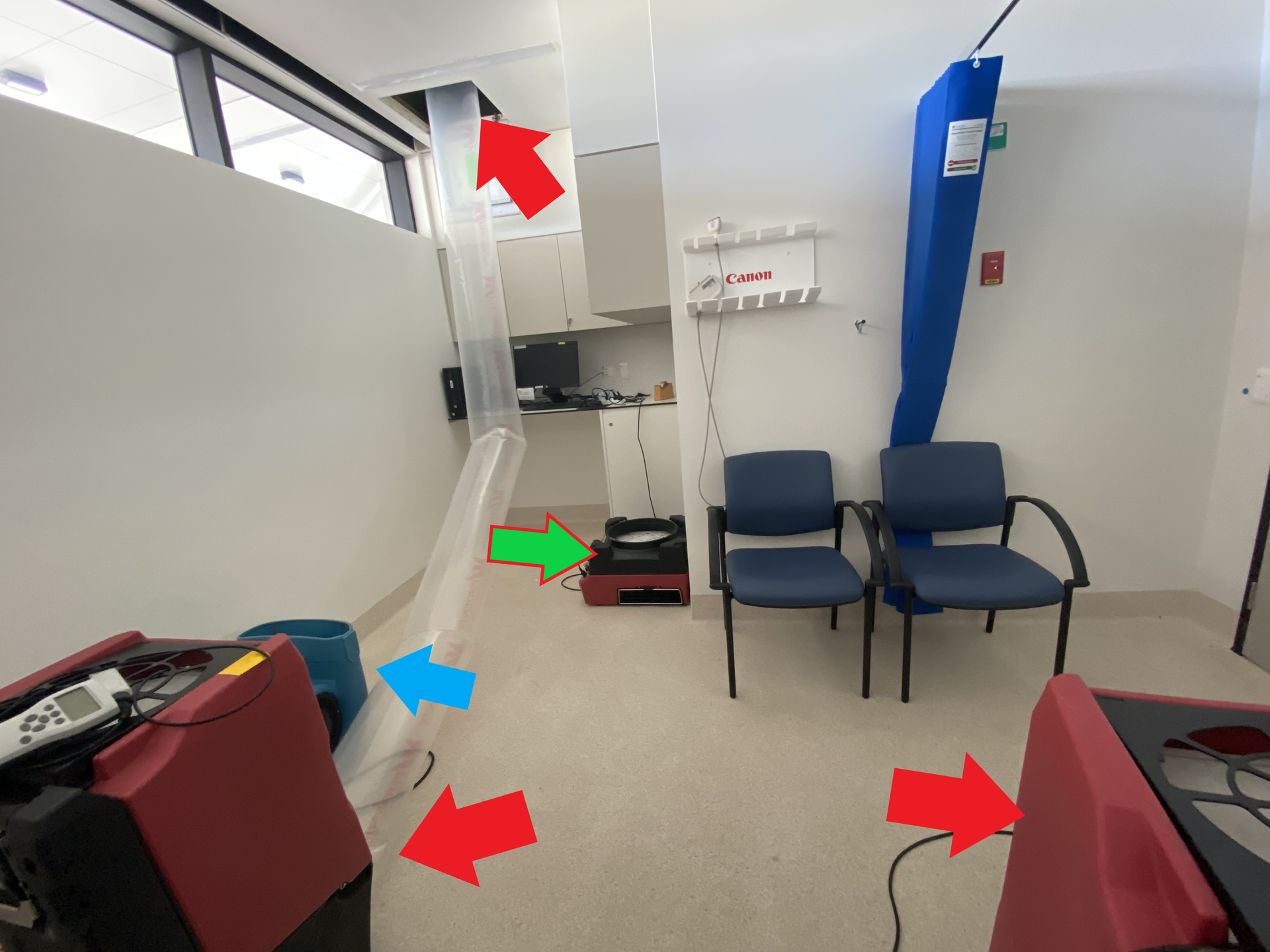 A Group of People Are Cleaning in a Kitchen — Restore All Qld in Kingaroy, QLD