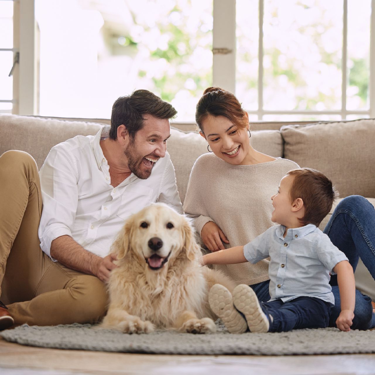 picture of a family with their dog and children