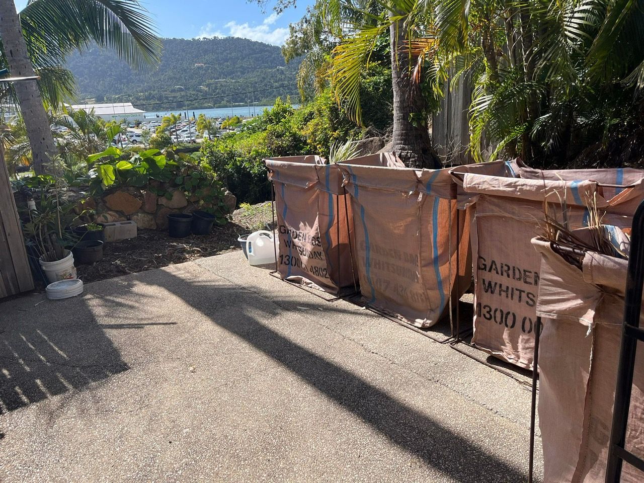 A Bunch Of Bags Are Sitting On The Side Of A Road — Garden Bag in Kelsey Creek, QLD