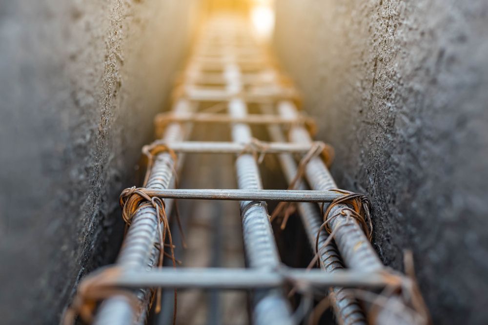 Reinforced Steel Bars Tied Together Inside A Concrete Form — Wieland Concreting in Rockhampton, QLD
