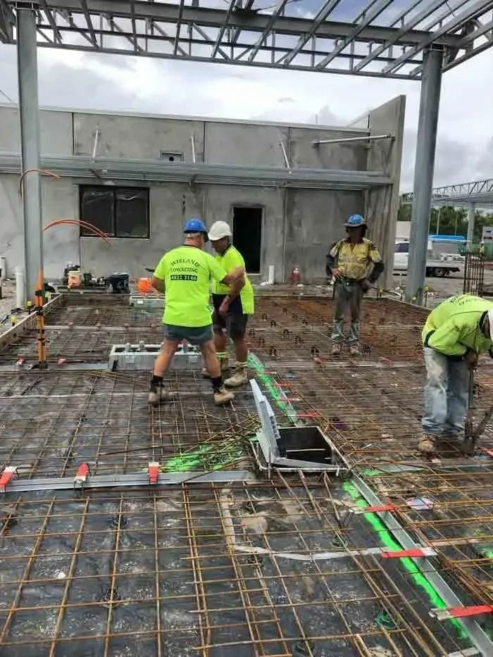 Construction Workers Install Wiring — Wieland Concreting in Rockhampton, QLD
