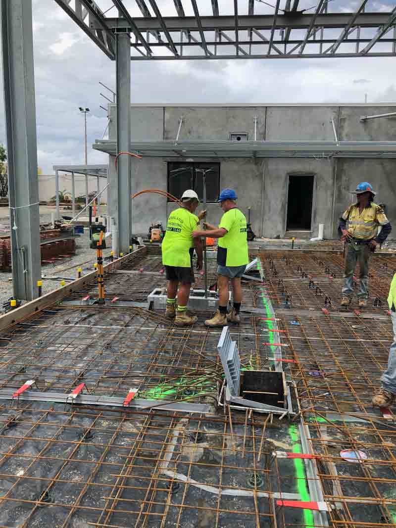 Construction Workers on A Concrete Slab — Wieland Concreting in Rockhampton, QLD